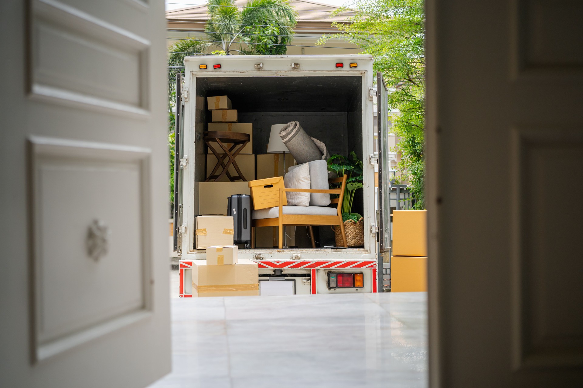 back of a truck carrying goods moving house