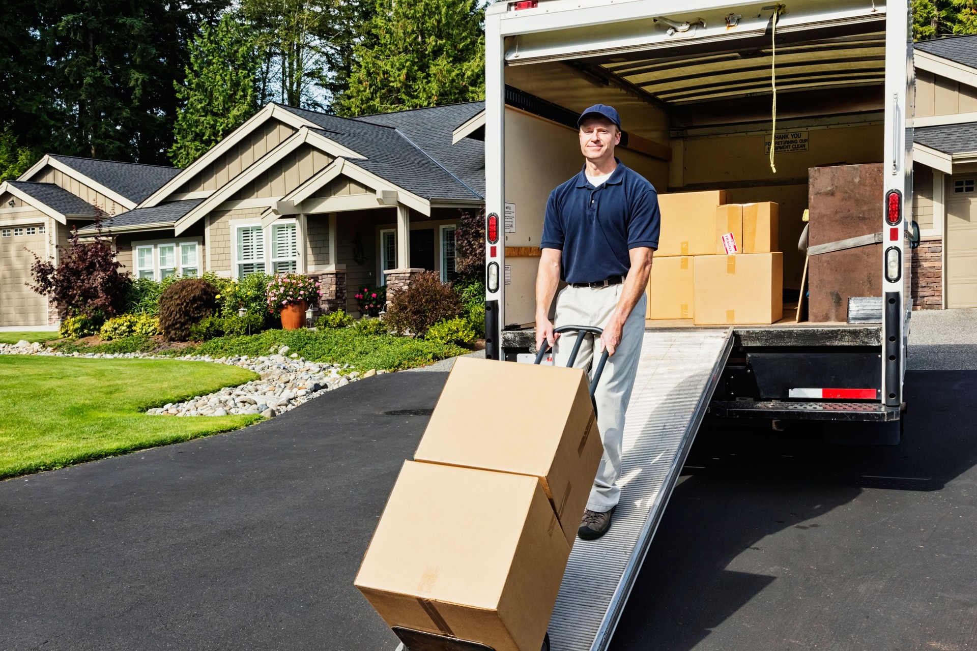 Delivery Man Unloading Truck